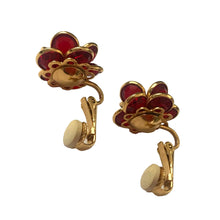 Load image into Gallery viewer, Vintage 1980s Swarovski ruby red crystal flower clip-on earrings in gold-tone settings, side view showing clip mechanism