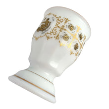 Load image into Gallery viewer, Unusual vintage milk glass goblet bearing the signs of the zodiac horoscope, featuring two medallions with the symbol and dates of the "Sagittarius" sign in both English and German. Graphics of the remaining zodiac signs appear on the sides of the gold rimmed goblet. Crafted in Germany.