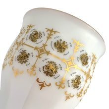 Load image into Gallery viewer, Unusual vintage milk glass goblet bearing the signs of the zodiac horoscope, featuring two medallions with the symbol and dates of the "Sagittarius" sign in both English and German. Graphics of the remaining zodiac signs appear on the sides of the gold rimmed goblet. Crafted in Germany.