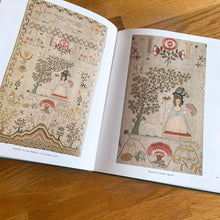 Load image into Gallery viewer, A superb collection of antique and vintage cross stitch needlework sampler patterns from America, England, Holland and Germany depicting the natural world, home life, the alphabet and religious imagery. 33 wonderful illustrations, 40 pages of chart patterns, historical information, helpful hints and instructions. Written by Irmgard Gierl.