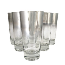 Load image into Gallery viewer, Get your Mad Men on with this set of six vintage silver fade double shot whiskey glasses. Produced by Queen's Lustreware by Vitreon USA. An unusual shape and size, just perfect to treat your guests to some sippin whiskey! In used vintage condition, no chips or cracks, some wear to the silver fade. Measures 2 3/4 x 2 3/4 inches