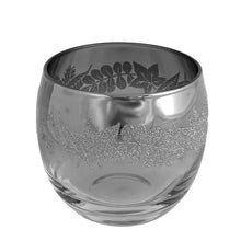 Load image into Gallery viewer, Fabulous vintage mid-century silver fade roly poly cocktail glass, decorated with a silver top that fades to clear glass and silver sugar texture leaves. Bonus, roly poly glasses are resistant to tipping over. Crafted by Vitreon Queen's Lustreware, 1960s. Add some serious Mad Men vibes to your bar cart with these beauties!
In excellent condition, no chips, minor wear.
Measures 3 1/4 x 3 inches
Capacity 12 ounces