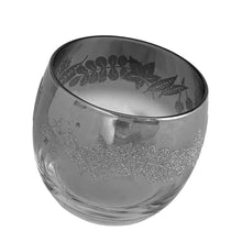 Load image into Gallery viewer, Fabulous vintage mid-century silver fade roly poly cocktail glass, decorated with a silver top that fades to clear glass and silver sugar texture leaves. Bonus, roly poly glasses are resistant to tipping over. Crafted by Vitreon Queen's Lustreware, 1960s. Add some serious Mad Men vibes to your bar cart with these beauties!
In excellent condition, no chips, minor wear.
Measures 3 1/4 x 3 inches
Capacity 12 ounces