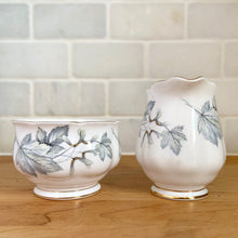 Load image into Gallery viewer, Close-up of Royal Albert Silver Maple pattern — delicate grey-blue maple leaves and seeds on white bone china