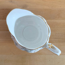 Load image into Gallery viewer, Overhead view of Royal Albert Silver Maple gravy boat – spout and pour detail, showing condition of gold gilding and bone china translucency