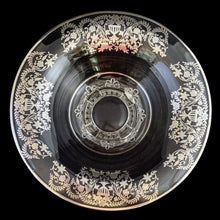 Load image into Gallery viewer, This striking vintage clear glass console bowl with silver overlay is a simply stunning. The silver overlay was produced by the Silver City Glass Co., circa 1940s. This generous sized console bowl. It will elevate any occasion to a special one. A beautiful addition to any collection and a lovely way to add a touch of vintage charm to your home. Would make a spectacular wedding gift! In excellent condition, free from chips, silver is intact. Measures 12 1/4 x 4 1/2 inches