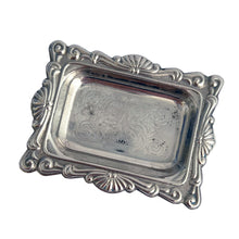 Load image into Gallery viewer, Vintage diamond pattern cut glass salt and pepper shakers with silver plate lids and tray. Crafted in Hong Kong, circa 1960s. A sweet set for your tablescape! In excellent vintage condition. Shakers measure 1 x 1 x 1 3/4 inches. Tray measures 3 1/8 x 2 3/8 inches.