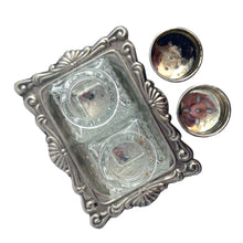 Load image into Gallery viewer, Vintage diamond pattern cut glass salt and pepper shakers with silver plate lids and tray. Crafted in Hong Kong, circa 1960s. A sweet set for your tablescape! In excellent vintage condition. Shakers measure 1 x 1 x 1 3/4 inches. Tray measures 3 1/8 x 2 3/8 inches.