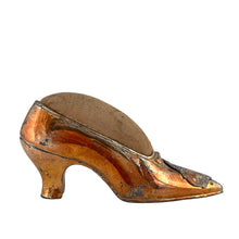 Load image into Gallery viewer, Vintage silver plated Empire State Building pin cushion shoe, having a superb design with an molded Empire State Building panel. A wonderful example of an early 20th century, (1930s), decorative and collectable souvenir.
The shoe is in good general condition, with age-related tarnishing of the silver plating and discolouration to the fabric of the pin cushion. Bottom marked JB 1671.
Measures 5 1/2 x 1 1/2 x 2 1/2 inches