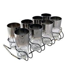 Load image into Gallery viewer, Angled view of set of 8 vintage silver fade highball tumblers in black wire caddy with striped wrapped handles, Vitreon Queen's Lustreware, 1960s