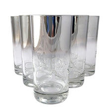 Load image into Gallery viewer, Close-up of six silver fade highball glasses grouped together showing silver-to-clear gradient and thick glass bases