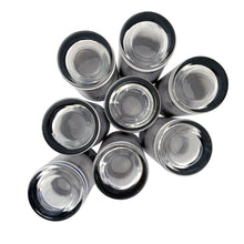 Load image into Gallery viewer, Bottom view of eight silver fade highball tumblers showing clear glass bases