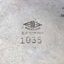 Load image into Gallery viewer, Close up of base of vintage silver plate vase showing Benedict-Proctor maker's mark and model number 1035, made in Canada