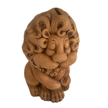 Load image into Gallery viewer, Adorable smiling sleepy lion ceramic coin bank. Atlantic Mold, USA. This piece was painted in 1980 and is marked "Fisher 80", plus the Atlantic Mold ©. A nice hand painted hobbyist creation that is glazed in a neutral matte camel brown glaze making it easy to fit in with any decor. In excellent condition, free from chips/cracks. Measures 4 1/2 x 5 3/4 x 8 inches
