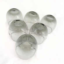 Load image into Gallery viewer, Detail of rounded bottom on Libbey smokey gray roly poly cocktail glasses, 1960s