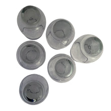 Load image into Gallery viewer, Bottom-up view of 6 vintage smoke Libbey Tempo glass tumblers showing bases and smoky amber glass showing maker's mark
