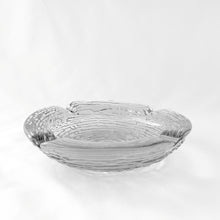 Load image into Gallery viewer, Feast your eyes on this heavy, yet stylish bark-patterned "Soreno - Clear" pressed glass ashtray from Anchor Hocking USA, crafted between 1966-1970! Add a touch of timeless elegance to any room in your home! In excellent condition, free from chips. Measuring 4 1/4 x 1 1/8 inches