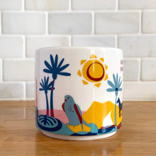 Load image into Gallery viewer, Perfect for your morning cuppa joe to make you feel like a world traveller! This fabulous collectible UNITED ARAB EMIRATES ceramic mug was produced by Starbucks as part of their "YOU ARE HERE" collection, 2018. A white ceramic mug printed design in shades of pink, blue, red and yellow with blue interior. Celebrate the Make it Happen country!
In excellent condition, free from chips/cracks/wear.
Measures 3 5/8 x 3 3/8 inches
Capacity 14 ounces