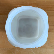 Load image into Gallery viewer, Vintage milk glass shaker featuring an pressed starburst pattern. Produced by McKee Glass, circa 1950. Beautiful art deco design to add to your shaker collection and tableware. In excellent condition, free from chips. Metal lid may have been repainted. 2 3/8 x 2 3/8 x 4 1/2 inches