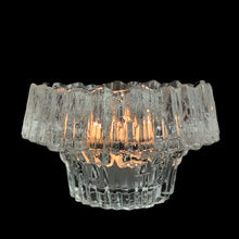 Load image into Gallery viewer, Vintage Stellaria clear art glass votive candle holder featuring a textured ice design. Designed by Tapio Wirkkala Ahlstrom for Iittala, Finland, 1970s. Add a little Finnish design style to your home decor with this striking design!
In excellent condition, no chips.
Measures 4 x 1 2 1/2 inches