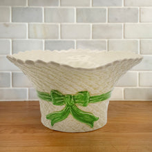 Load image into Gallery viewer, Delightful vintage pale yellow straw hat with green bow ceramic planter pot. Crafted by Falcon Ware, England, 1940s. A charming home for your favourite flowering houseplant or greenery.
In excellent condition, no chips/cracks/repairs.
Measures 7 3/4 x 4 inches