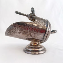 Load image into Gallery viewer, This vintage silver plated sugar scuttle and scoop set, etched with a design of fluorishes and florals. It's just a beautiful vessel for sugar cubes or bath salts. Produced by Barker Ellis Silver Co Ltd, Birmingham England, circa 1960s.