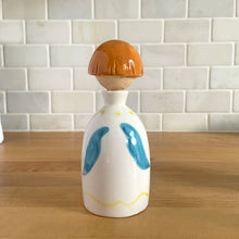 Load image into Gallery viewer, Vintage "Sugar and Spice and Everything Nice" decanters and jar lid. Created by Earl Bernhard and made in Japan. Sweet decorative ceramics! Sugar and Spice decanter jars measure 2 1/8 x 5 1/4 Everything Nice lid measures 2 1/4 x 3 1/8 (chip to underside of rim)