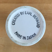 Load image into Gallery viewer, Vintage "Sugar and Spice and Everything Nice" decanters and jar lid. Created by Earl Bernhard and made in Japan. Sweet decorative ceramics! Sugar and Spice decanter jars measure 2 1/8 x 5 1/4 Everything Nice lid measures 2 1/4 x 3 1/8 (chip to underside of rim)