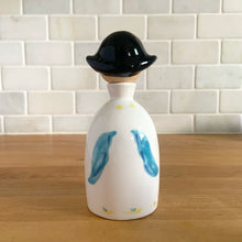 Load image into Gallery viewer, Vintage "Sugar and Spice and Everything Nice" decanters and jar lid. Created by Earl Bernhard and made in Japan. Sweet decorative ceramics! Sugar and Spice decanter jars measure 2 1/8 x 5 1/4 Everything Nice lid measures 2 1/4 x 3 1/8 (chip to underside of rim)