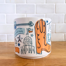 Load image into Gallery viewer, Perfect for your morning cuppa joe! This fabulous collectible TEXAS ceramic mug was produced by Starbucks as part of their "Been There Series" Across The Globe Collection, 2018. A white ceramic mug printed design in shades of blue and orange with orange interior. Celebrate the lonestar state! In excellent condition, free from chips/cracks/wear. Measures 3 5/8 x 3 3/8 inches Capacity 14 ounces