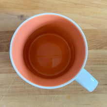 Load image into Gallery viewer, Perfect for your morning cuppa joe! This fabulous collectible TEXAS ceramic mug was produced by Starbucks as part of their "Been There Series" Across The Globe Collection, 2018. A white ceramic mug printed design in shades of blue and orange with orange interior. Celebrate the lonestar state! In excellent condition, free from chips/cracks/wear. Measures 3 5/8 x 3 3/8 inches Capacity 14 ounces