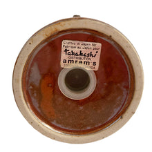 Load image into Gallery viewer, Base of vintage Takahashi rust lava glaze shaker showing original rubber stoppers and sticker, 1970s Japanese tableware