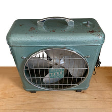 Load image into Gallery viewer, Angled top view of vintage ZERO electric box fan showing teal enamel housing with age-worn patina, chrome carry handle, and speed control knob