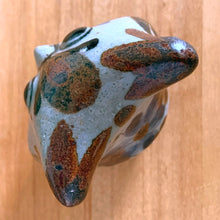 Load image into Gallery viewer, Vintage hand crafted Tonala folk art pottery owl figurine, hand painted and signed by artist Jorge Wilmot, Mexico. This owl has striking eyes, florals in ochre, brown and blue on a gray ground.
In excellent condition, no chips/cracks/repairs.
Measures 2 1/4 x 2 x 2 3/8 inches