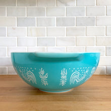 Load image into Gallery viewer, Vintage turquoise Butterprint 444 Cinderella mixing bowl. Crafted by PYREX, USA, 1957 - 1968. A true kitchen classic!
In very good vintage condition, scratches to the exterior, but otherwise no chips and shiny. Doesn't appear to have been used as there are no utensil marks on the interior.
Measures 13 x 4 1/2 inches
Capacity 4 quarts