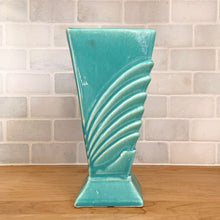 Load image into Gallery viewer, Side view of the turquoise McCoy Pottery vase, highlighting the glossy fan-ribbed design along one edge