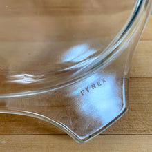 Load image into Gallery viewer, Close-up of clear glass PYREX 475-C lid tab handle showing embossed "PYREX" brand mark