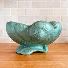 Load image into Gallery viewer, RARE FIND!
Stunning vintage mid-century era art deco Elegance line footed planter resembling a curled waves or shell, glazed with a luminous turquoise, shape 1418. Crafted by Shawnee Pottery, USA, 1950s. A gorgeous must-have for any Shawnee or planter collector!
In excellent condition, no chips/cracks/repairs.
Measures 8 x 5 3/4 x 4 1/2 inches