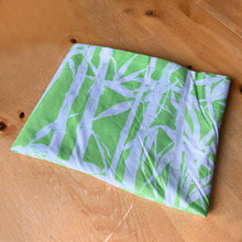Load image into Gallery viewer, Vintage Ultracale Bamboo flat queen poly cotton sheet featuring a pattern of white bamboo botanicals on green. Crafted by Wamsutta, USA, 1977. A beautiful addition to your Hollywood Regency retro bedding decor or repurpose for crafting.
In excellent vintage condition, no stains/tears.
Measures 108 x 98 inches