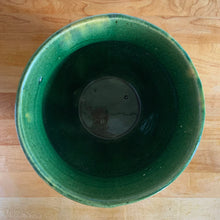 Load image into Gallery viewer, Rare antique Art Deco blended gloss glazed "V" jardiniere planter pot, features an overlapping pointed leaf or sunburst pattern on green, blue and yellow blend of glazes. Crafted by McCoy Pottery, USA, 1920s. This rare vintage planter is highly sought after and a must-have for any McCoy collector or container garden lover!
In excellent vintage condition, no chips/cracks/repairs, age-related crazing, manufacturer's glaze pops, minor hard water marks. Unmarked.
Measures 7 1/4 x 6 1/2 inches