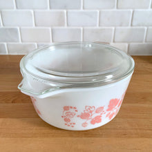 Load image into Gallery viewer, Angled side view of vintage pink PYREX Gooseberry casserole dish showing depth, handles, and Gooseberry print detail