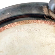 Load image into Gallery viewer, Close-up of impressed WEDGWOOD maker's mark on the unglazed ceramic base, with silver-plated mount edge and aged patina detail visible