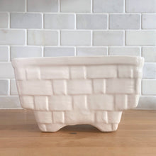 Load image into Gallery viewer, Vintage gloss white glazed figural rectangular strawberry basket ceramic planter. Crafted by Brush Pottery, 1940s. This rare piece is must for any Brush art pottery collector!
In excellent vintage condition, no chips/cracks/repairs. Maker's mark.
Measures 7 1/2 x 5 1/2 x 4 1/8 inches