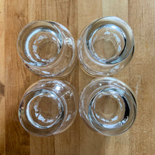 Load image into Gallery viewer, Vintage drinkware featuring a band of white grapevines on feminine flared shaped clear glass in 6, 8 and 10 ounce sets of four. Manufactured by St. Clair Division of Domglas Ltd., Canada, circa 1970s. These glasses are lovely and would make a perfect housewarming gift! In excellent condition, new old stock in original boxes.