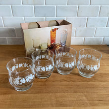 Load image into Gallery viewer, Vintage drinkware featuring a band of white grapevines on feminine flared shaped clear glass in 6, 8 and 10 ounce sets of four. Manufactured by St. Clair Division of Domglas Ltd., Canada, circa 1970s. These glasses are lovely and would make a perfect housewarming gift! In excellent condition, new old stock in original boxes.