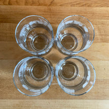 Load image into Gallery viewer, Vintage drinkware featuring a band of white grapevines on feminine flared shaped clear glass in 6, 8 and 10 ounce sets of four. Manufactured by St. Clair Division of Domglas Ltd., Canada, circa 1970s. These glasses are lovely and would make a perfect housewarming gift! In excellent condition, new old stock in original boxes.