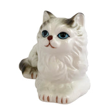Load image into Gallery viewer, Delightful vintage white and gray Persian cat ceramic porcelain figurine. Imported by Giftcraft from Japan 1970s. Add this sweet figurine to your collection!
In excellent condition, no chips/cracks/repairs. Original stickers.
Measures 3 7/8 x 2 3/8 x 2 3/8 inches