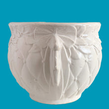 Load image into Gallery viewer, Large vintage Tierra Cushion jardiniere planter pot, aqua shiny glaze, features an overlapping floral leaf pattern around the top rim, a diamond quilted body and ribbon handles. Crafted by McCoy Pottery, USA, 1950s. A must-have for any McCoy collector or gardener!
In good vintage condition, free from chips, cracks or repairs, with crazing commensurate with age, see photos. Maker's mark is on the bottom.
Measures 8 3/4 x 7 1/2 inches
