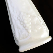 Load image into Gallery viewer, This vintage mid-century "Paneled Grape" milk glass swung bud vase will add simple elegant to your decor. Crafted by Westmoreland Glass, USA between 1940 - 1984. Fill with some sweet floral stems for a delightful arrangement.  In excellent condition, free from chips/cracks. Maker's mark on the bottom.  Measures 1 3/4 x 9 1/4 inches