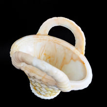 Load image into Gallery viewer, Vintage marbleized slag glass handled basket in swirled shades of white and orange. Produced by Akro Agate, circa 1940s. A lovely piece for to use as a vase, planter catchall, candy dish or upscale your office and use this as a paperclip holder. In good vintage condition, free from chips, one handle has a crack. Unmarked. Measures 4 x 2 3/4 x 3 7/8 inches